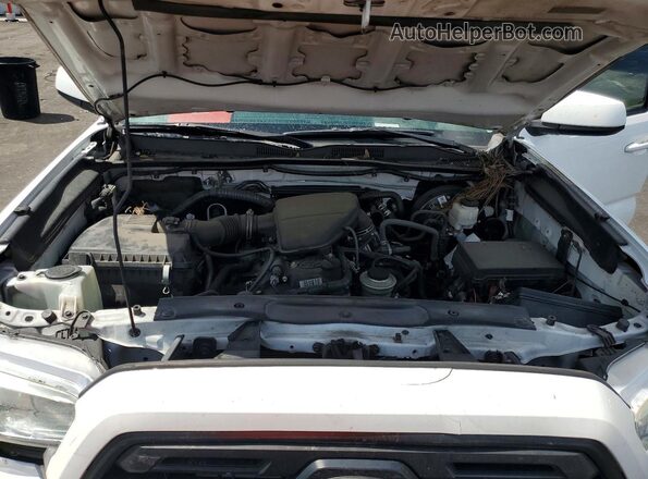 5TFRX5GN0KX165252 2019 TOYOTA TACOMA White Widok wnętrza z tyłu