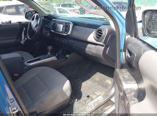 5TFSX5EN2KX070048 2019 TOYOTA TACOMA Blue Widok wnętrza z przodu