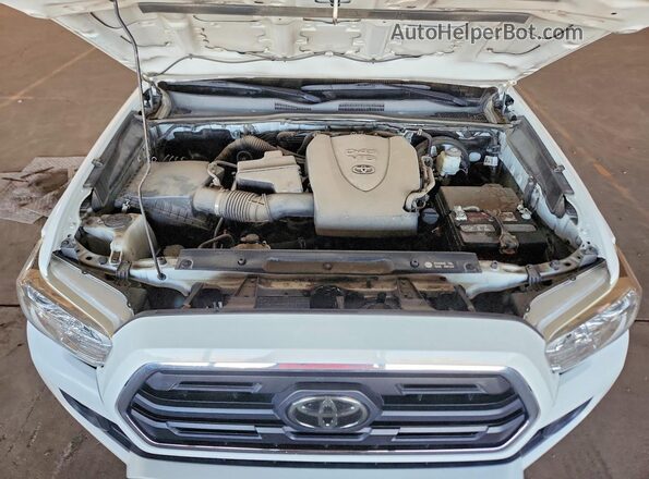 5TFSZ5AN2KX201768 2019 TOYOTA TACOMA White უკანა სალონის ხედი