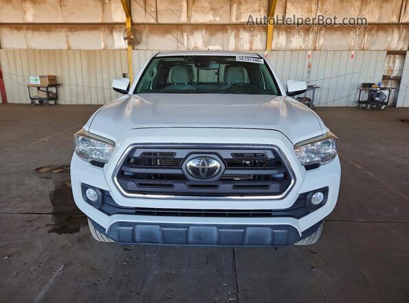 5TFSZ5AN2KX201768 2019 TOYOTA TACOMA White წინა ხედი