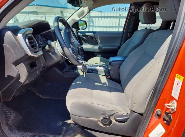 5TFSZ5AN8GX001081 2016 TOYOTA TACOMA Orange Vista interior delantera