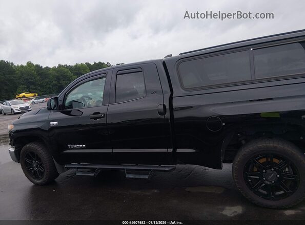 5TFUY5F13MX003379 2021 TOYOTA TUNDRA Black Widok wnętrza z tyłu