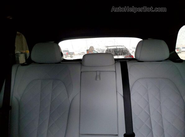 5UX13EU02R9U24290 2024 BMW X5 Gray Rear seats view