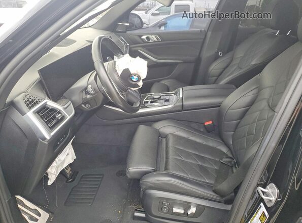 5UX13EU07R9S70272 2024 BMW X5 Black Vista interior delantera