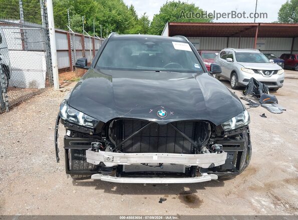 5UX13EU07T9052842 2026 BMW X5 Black Rear interior view