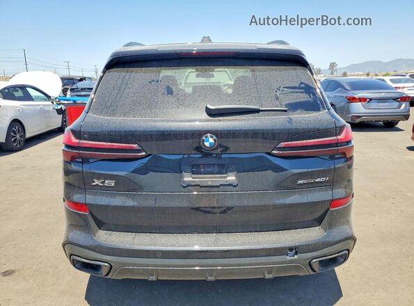 5UX13EU09T9301402 2026 BMW X5 Black Вид ззаду