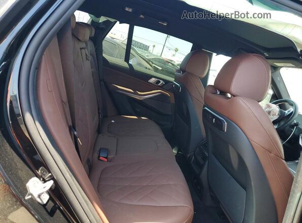 5UX13EU09T9301402 2026 BMW X5 Black Вид задньої частини салону