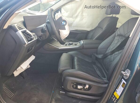 5UX23EM01P9R09411 2023 BMW X7 Blue Widok wnętrza z przodu