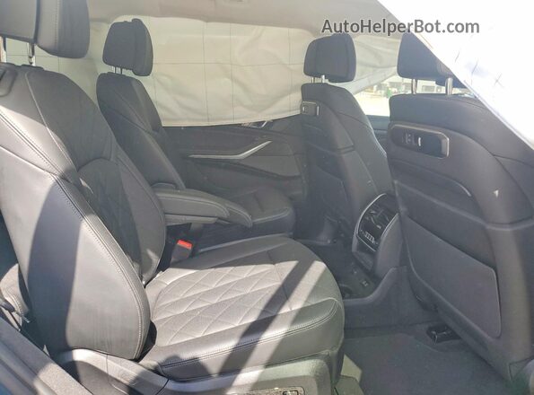 5UX23EM01P9R09411 2023 BMW X7 Blue Widok wnętrza z tyłu
