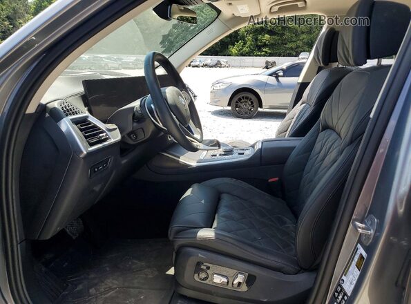 5UX23EM03R9V72744 2024 BMW X7 Silver Front interior view