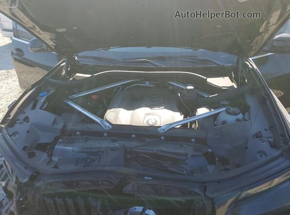 5UX23EM09R9V13245 2024 BMW X7 Black Widok komory silnika