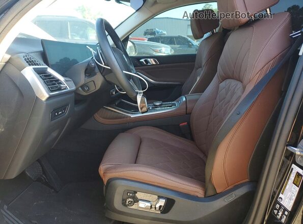 5UX23EM09R9V13245 2024 BMW X7 Black Widok wnętrza z przodu