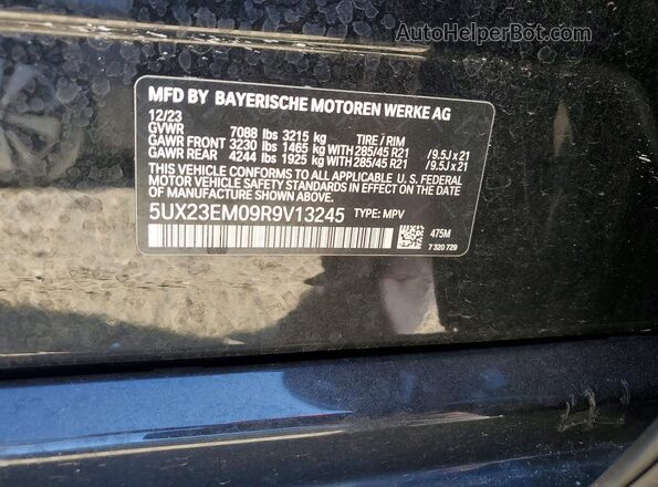 5UX23EM09R9V13245 2024 BMW X7 Black Widok naklejki z numerem VIN