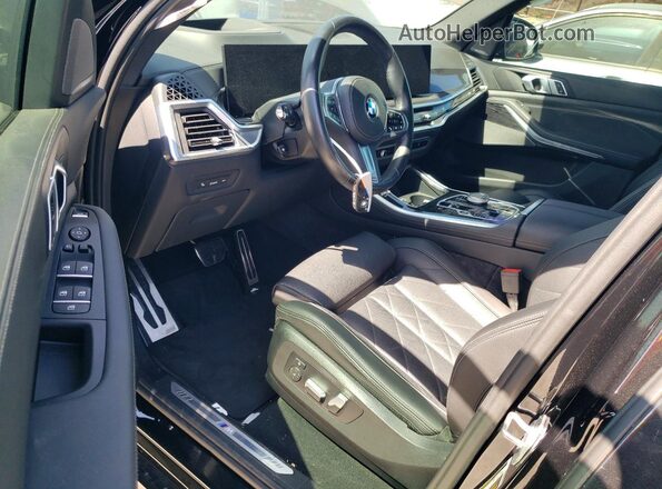 5UX23EU00R9V16020 2024 BMW X5 Black Vista del salpicadero