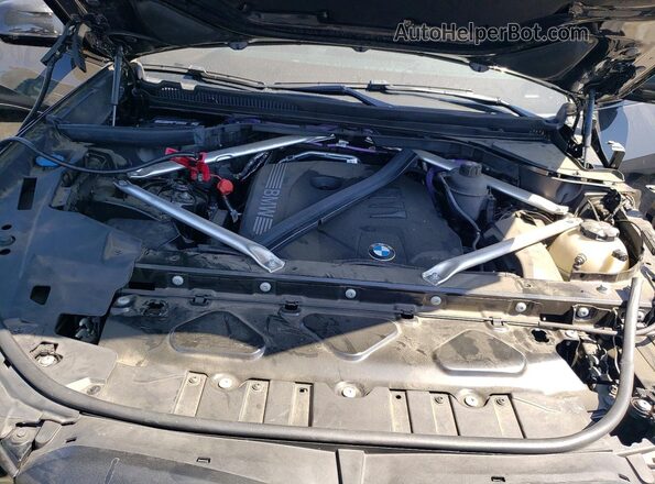 5UX23EU00R9V16020 2024 BMW X5 Black Vista interior trasera