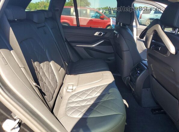 5UX23EU01R9V38057 2024 BMW X5 Black Vista interior trasera