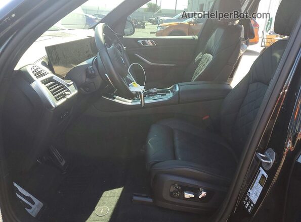 5UX23EU01R9V38057 2024 BMW X5 Black Vista interior delantera