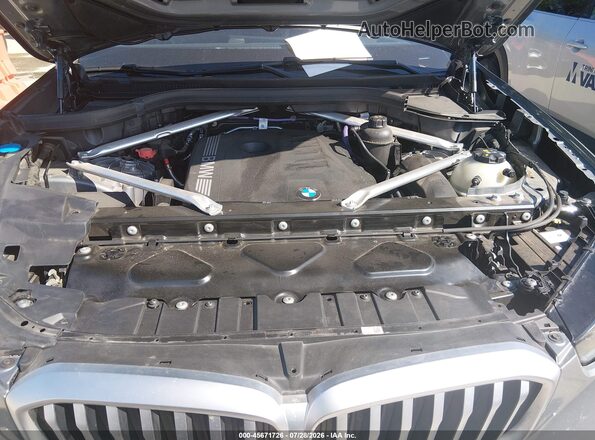 5UX23EU01T9105037 2026 BMW X5 Gray Rear view