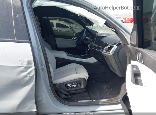 5UX23EU02R9V82164 2024 BMW X5 Blue Widok wnętrza z przodu
