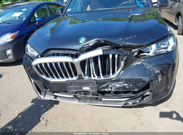5UX23EU02S9W44605 2025 BMW X5 Black ხელსაწყოთა პანელის ხედი