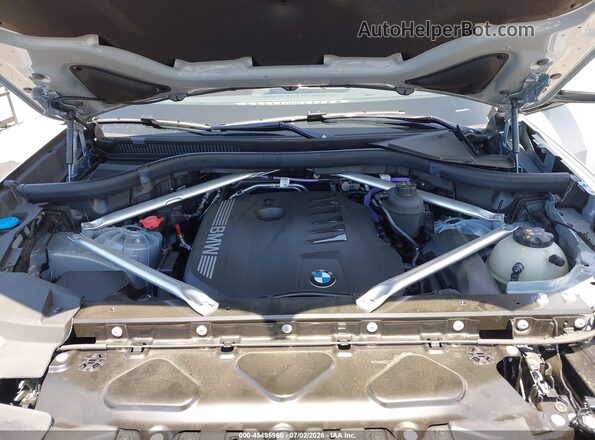 5UX23EU04R9V23410 2024 BMW X5 Light Blue Vista trasera