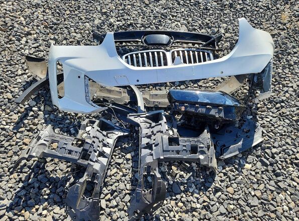 5UX23EU05R9S66337 2024 BMW X5 White Engine compartment view
