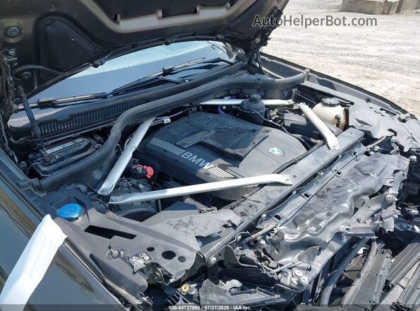 5UX23EU05S9W72060 2025 BMW X5 Green Widok z tyłu