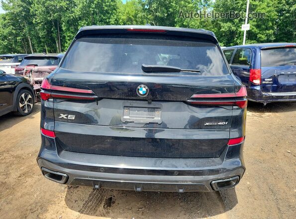 5UX23EU05S9Z30013 2025 BMW X5 Black Rear view