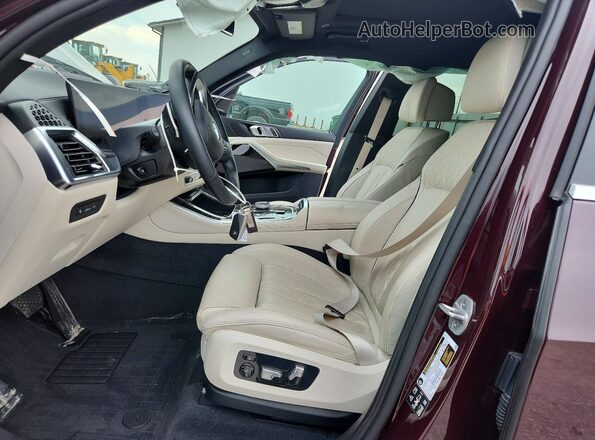 5UX23EU06S9Y13363 2025 BMW X5 Maroon Front interior view