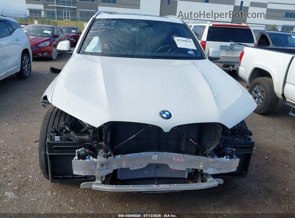 5UX23EU07R9V15852 2024 BMW X5 White Widok wnętrza z tyłu