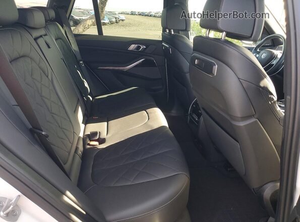 5UX23EU07S9Y56982 2025 BMW X5 White Rear seats view