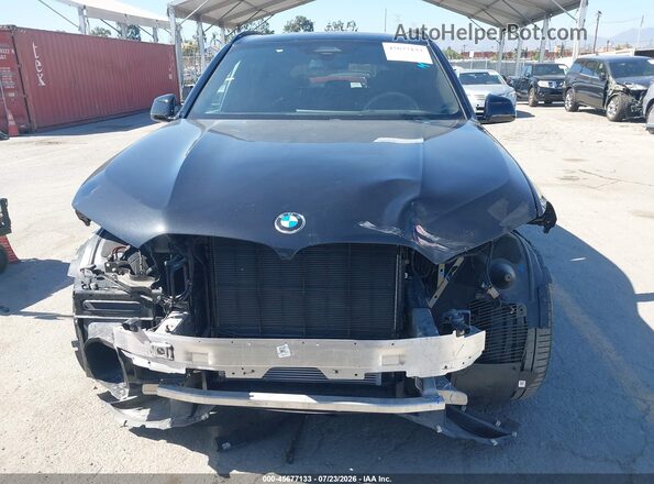 5UX23EU08R9T72510 2024 BMW X5 Black უკანა სალონის ხედი