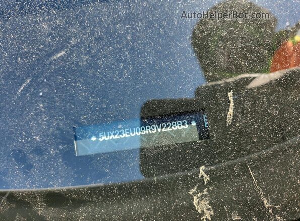 5UX23EU09R9V22883 2024 BMW X5 White VIN sticker view