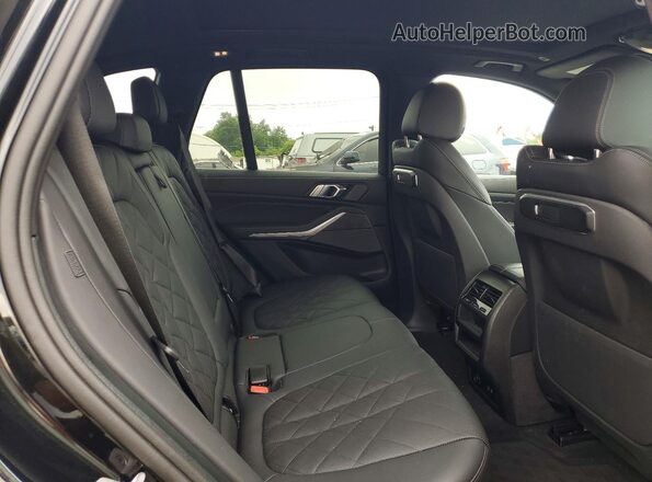 5UX23EU09R9V63093 2024 BMW X5 Black Vista interior trasera
