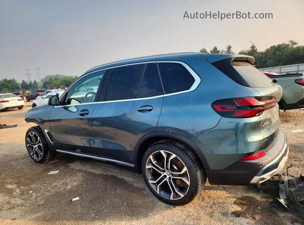 5UX23EU0XR9S15447 2024 BMW X5 Blue Trasero izquierdo