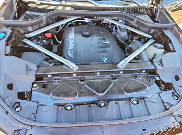 5UX23EU0XR9V62891 2024 BMW X5 Black Սալոնի հետևի տեսք