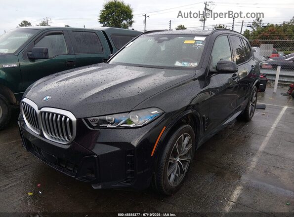 5UX23EU0XS9W69784 2025 BMW X5 Black Vista tres cuartos delantera izquierda