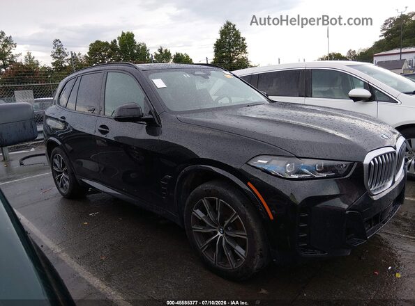 5UX23EU0XS9W69784 2025 BMW X5 Black Vista interior trasera