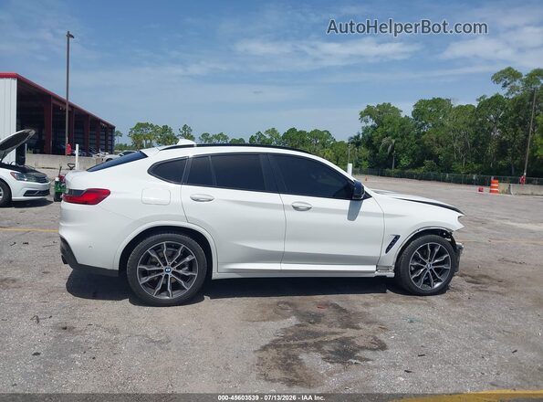 5UX2V1C00M9E90762 2021 BMW X4 White Widok wnętrza z tyłu
