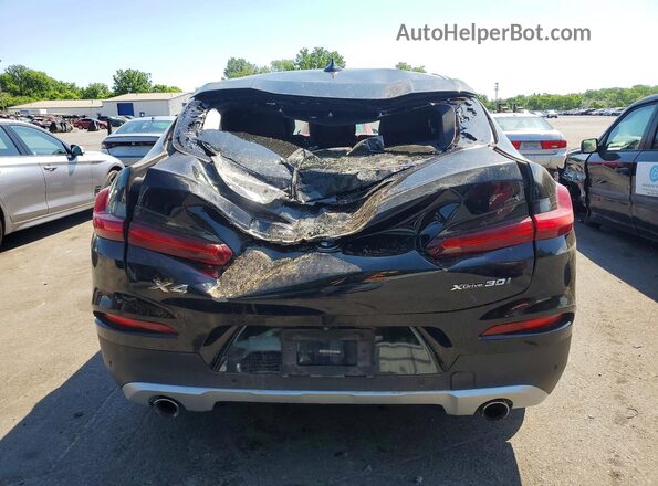 5UX2V1C09M9F37206 2021 BMW X4 Black Հետևի տեսք