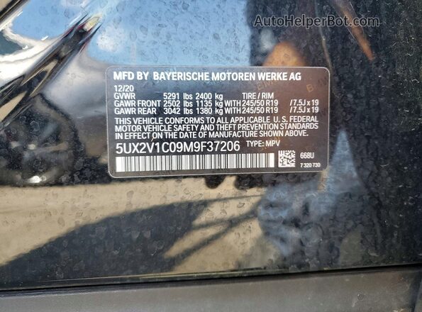 5UX2V1C09M9F37206 2021 BMW X4 Black VIN կոդի պիտակի տեսք