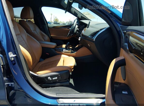 5UX2V5C01L9B52874 2020 BMW X4 Blue Front interior view