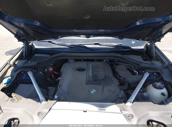 5UX2V5C01L9B52874 2020 BMW X4 Blue Rear view