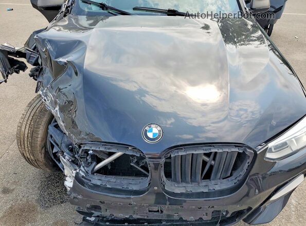 5UX2V5C02L9B85480 2020 BMW X4 Black Vista del compartimento del motor