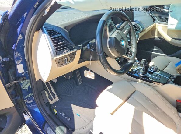 5UX2V5C03M9E50831 2021 BMW X4 Blue Вид панелі приладів