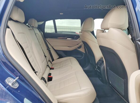 5UX2V5C08L9B04191 2020 BMW X4 Blue Widok wnętrza z tyłu