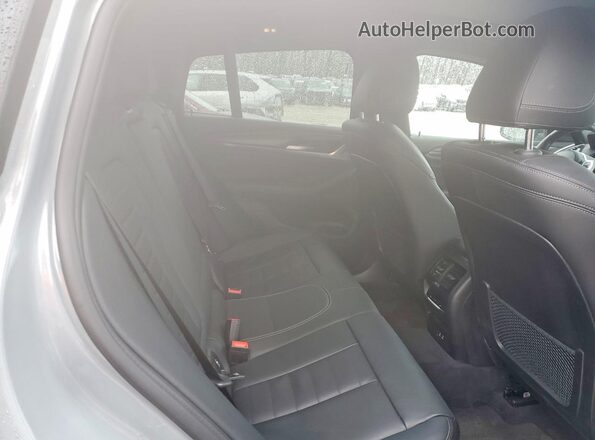 5UX33DT01N9L26057 2022 BMW X4 Gray Vista interior trasera
