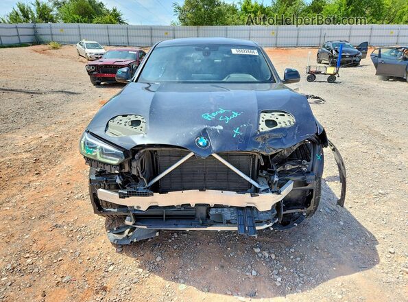 5UX33DT02N9L91340 2022 BMW X4 Gray Front view