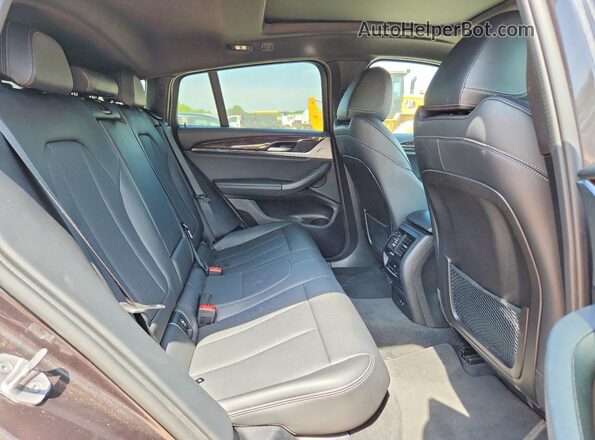 5UX33DT02N9L91340 2022 BMW X4 Gray Rear interior view