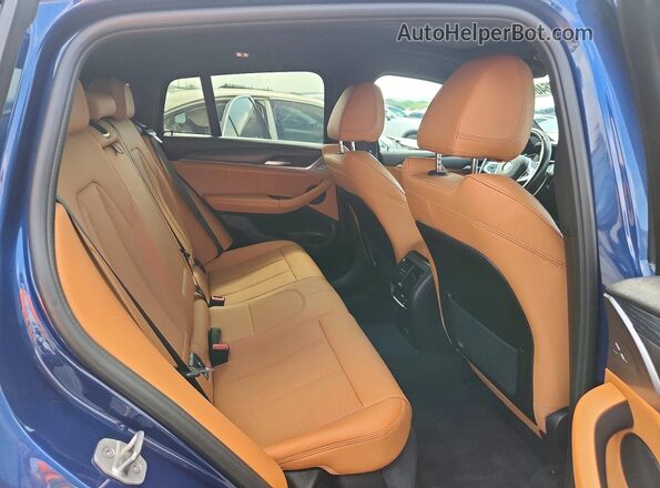 5UX33DT03N9K73863 2022 BMW X4 Blue Widok tylnych siedzeń